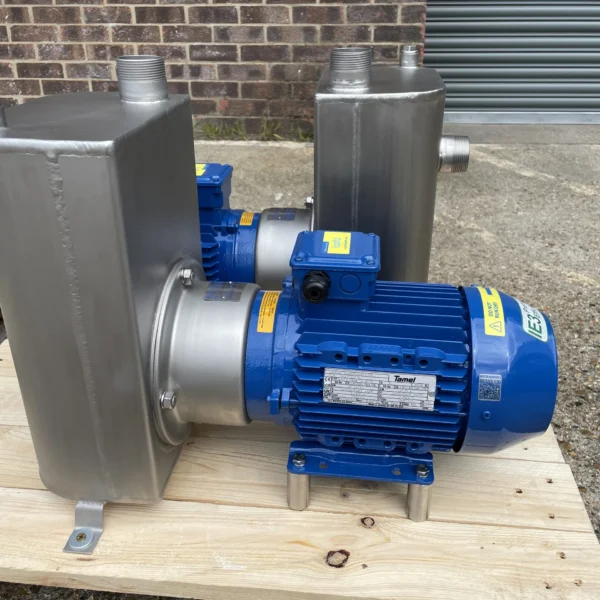 A picture of 2 industrial self priming centrifugal pumps on a pallet ready to be shipped to a client