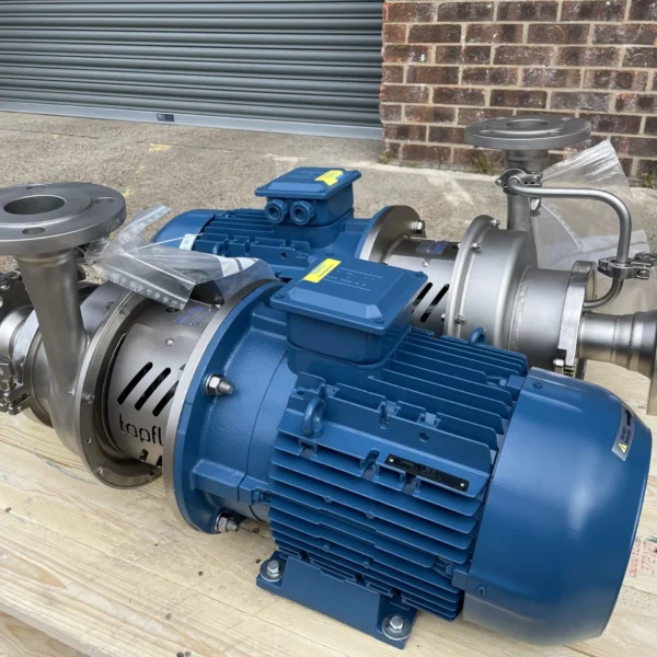 A side view picture of 2 self priming high performance centrifugal pumps on a pallet