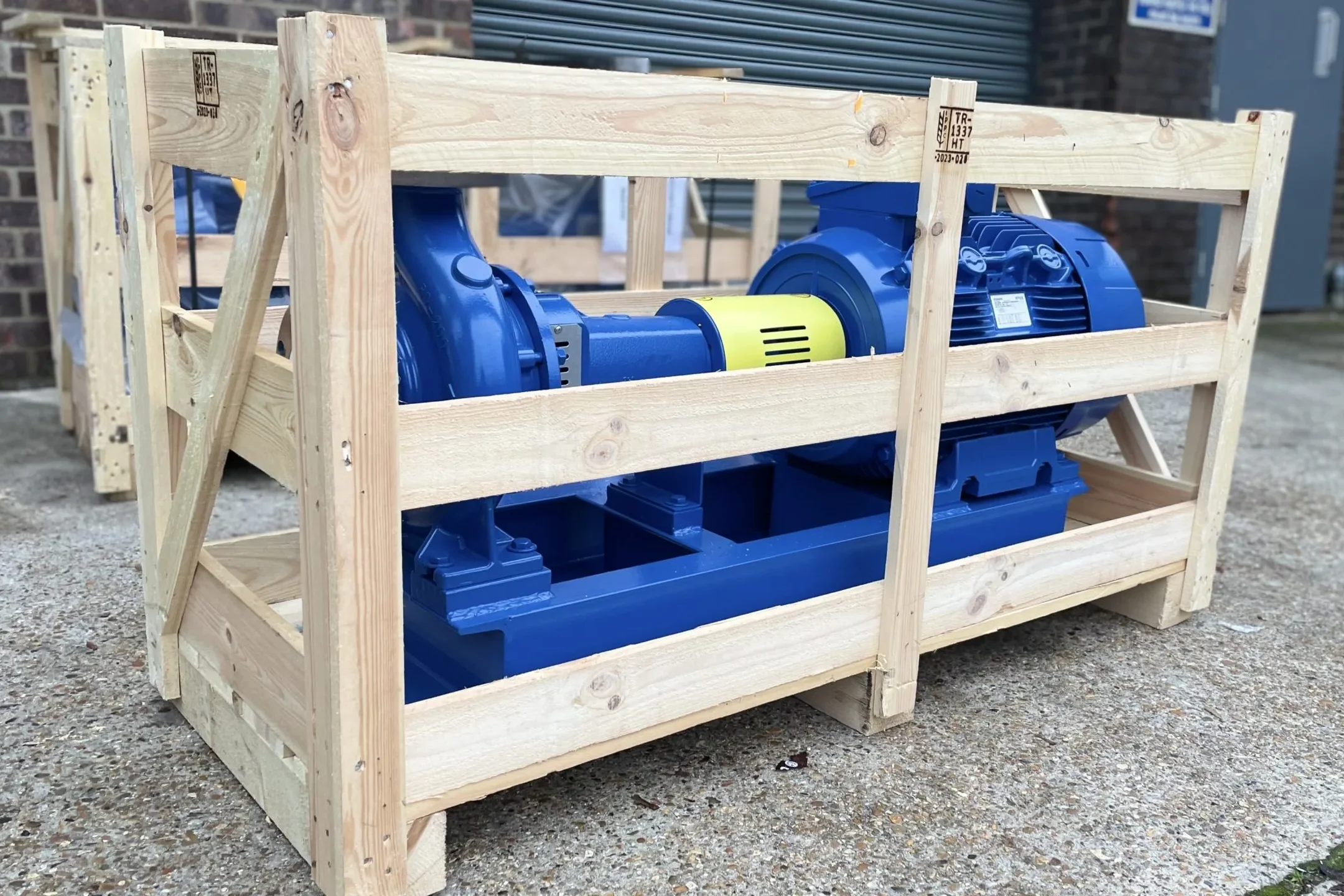 A side view picture of our EN733 centrifugal Pumps in a crate for shipping