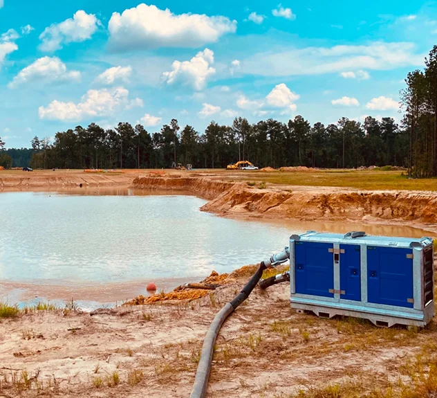 BA100E D265 multi-use Diesel Pump on site next to a dam