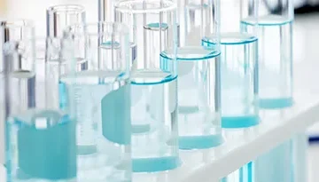 A photo of test tubes filled with chemicals