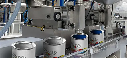 A photo of paint being pumped on a production line