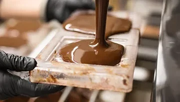 A photo of chocolate being pumped