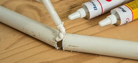 a photo of glue being used to fix something