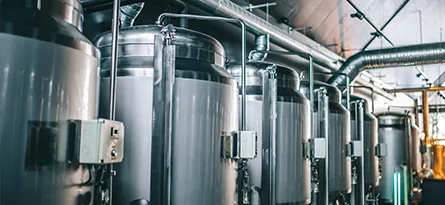 A photo of brewery tanks