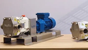 A photo of 2 Sanitary Lobe Pumps next to one another